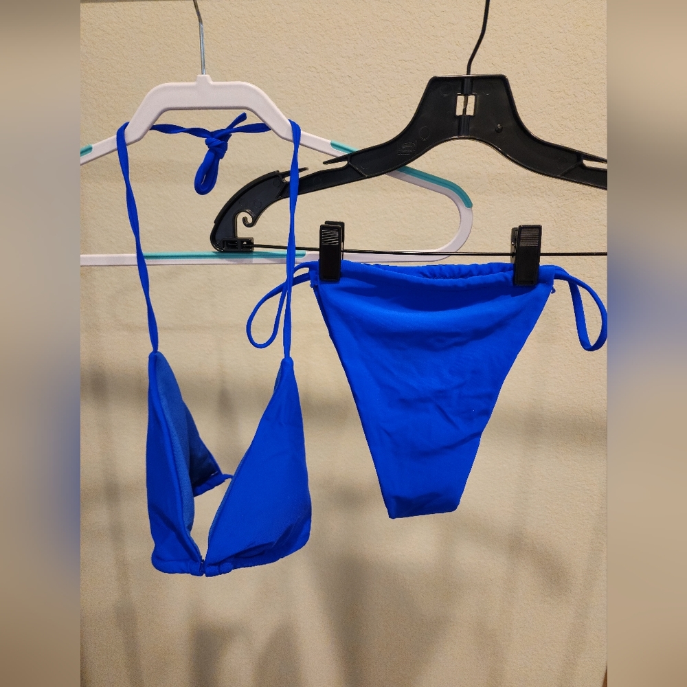 Brand new Royal Blue 2 piece bikini. Size Large.